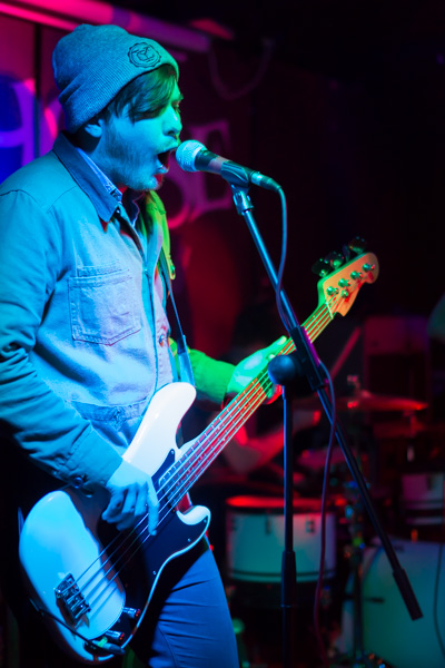 Band picture of bassist singing