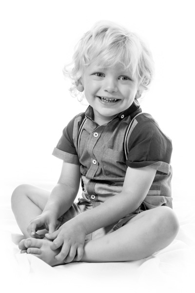 Portrait of smiling child on white